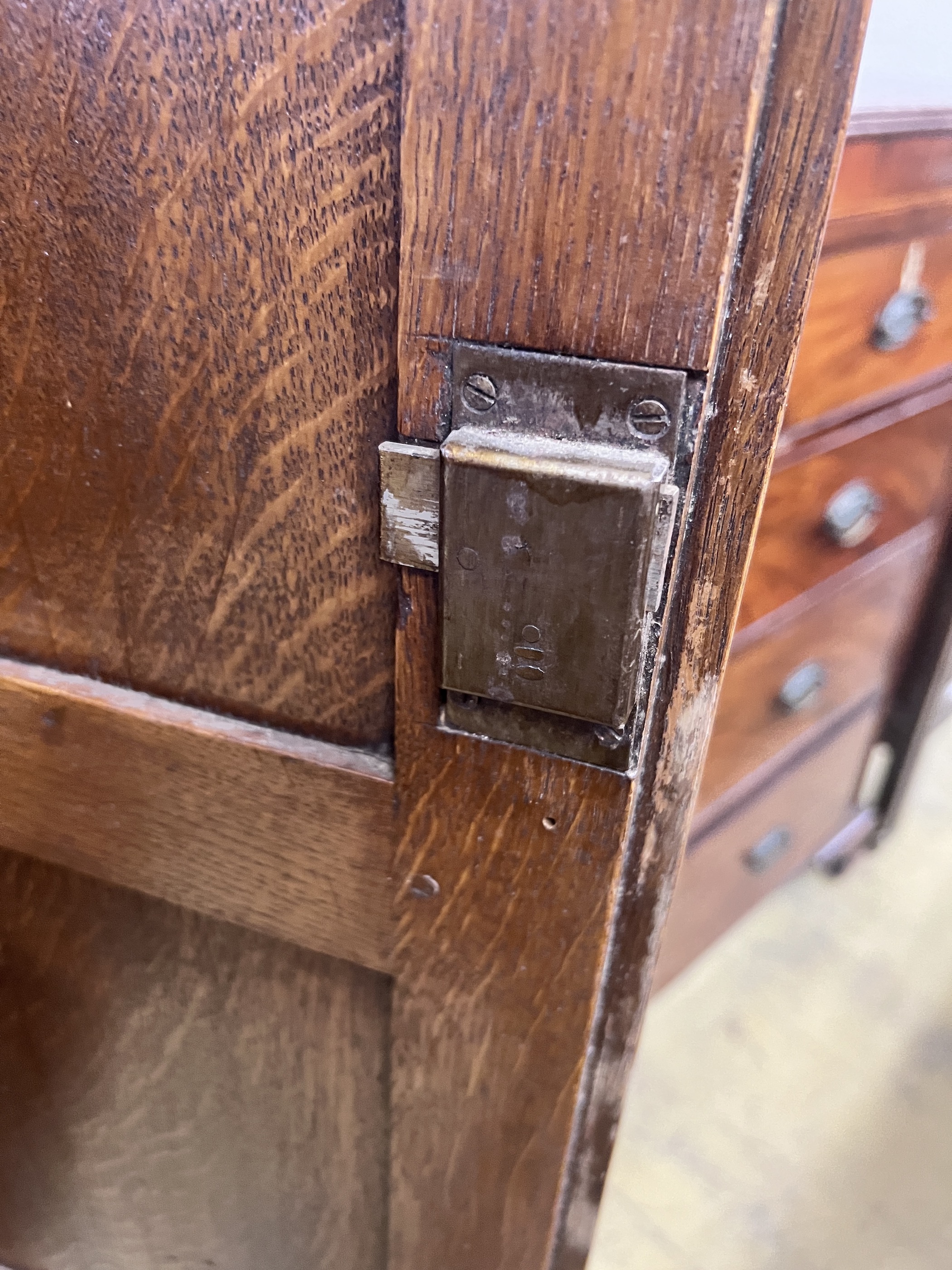 An 18th century style panelled oak hanging cupboard, width 96cm, depth 53cm, height 178cm